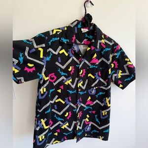 Vintage button down short sleeve top
Hawaiian Highways
Large